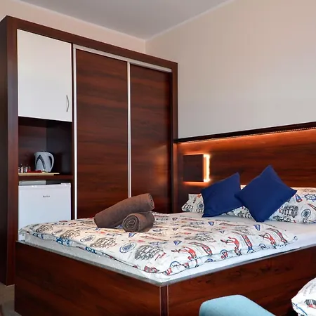 Pod Zegarem * ليبا