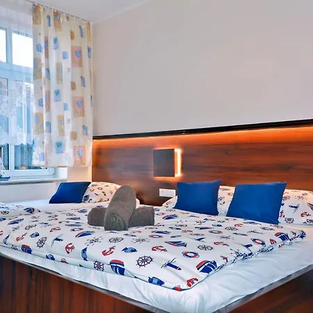 Pod Zegarem * ليبا