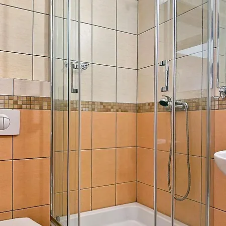 Pod Zegarem ليبا