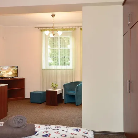 Pod Zegarem ليبا