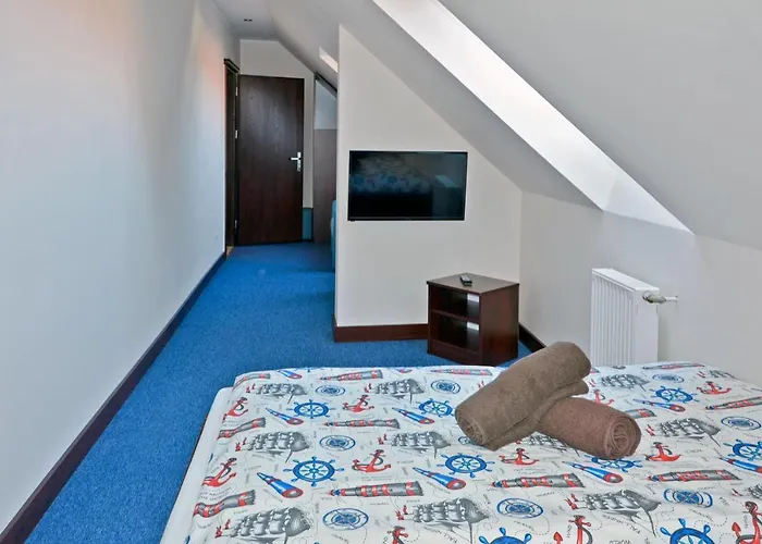 ホームステイ Pod Zegarem