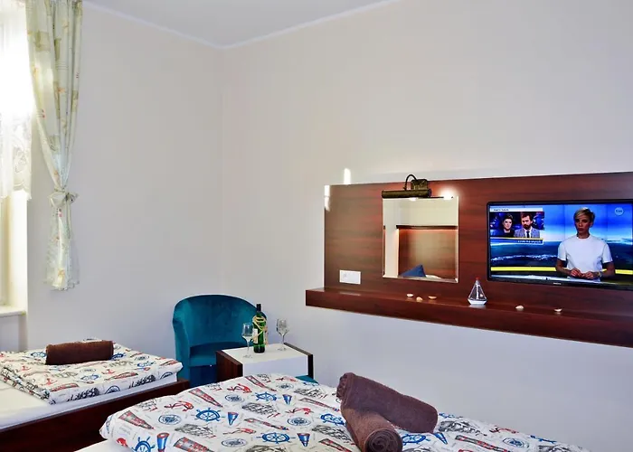 ホームステイ Pod Zegarem *