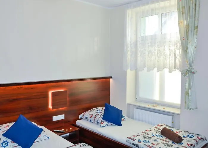 ホームステイ Pod Zegarem